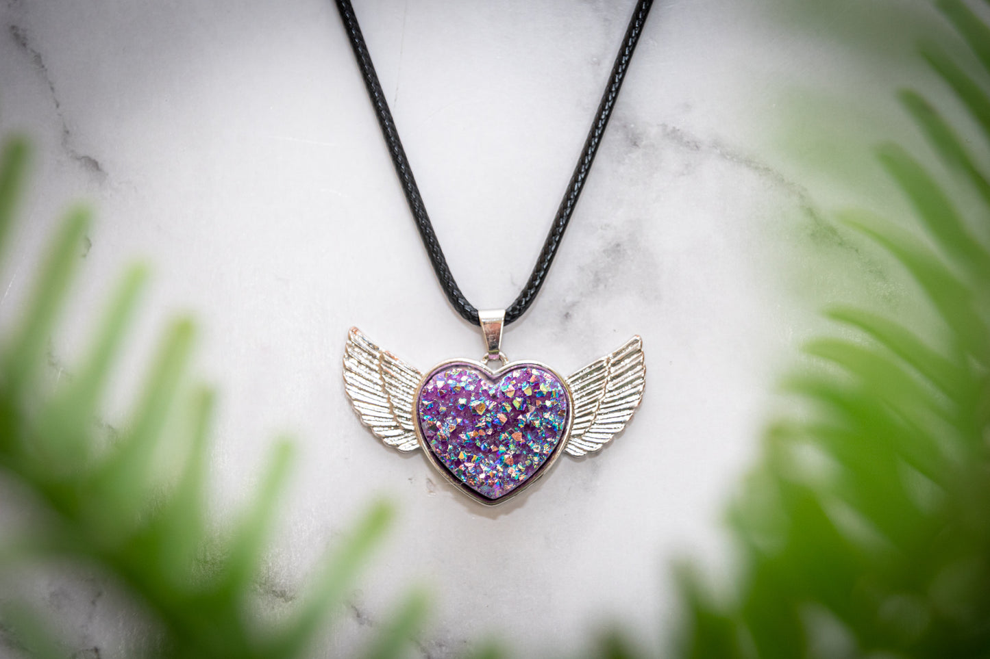 Aura quartz heart wing necklace