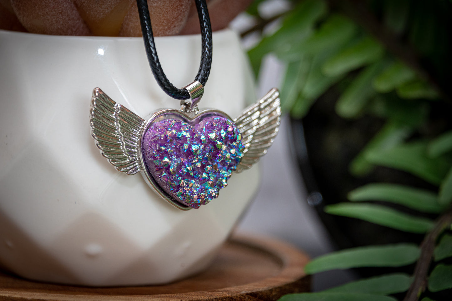 Aura quartz heart wing necklace