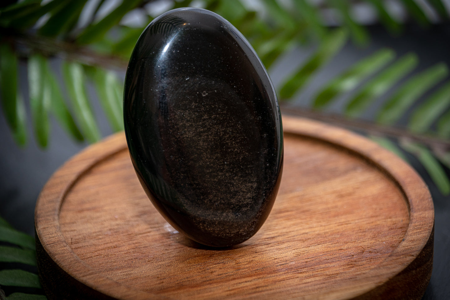 Silver sheen obsidian palm stone