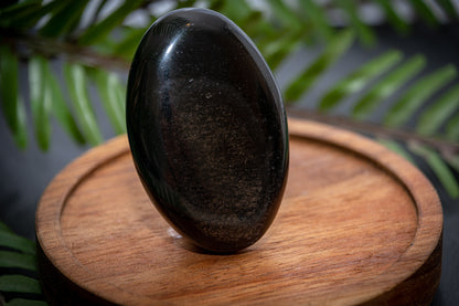 Silver sheen obsidian palm stone