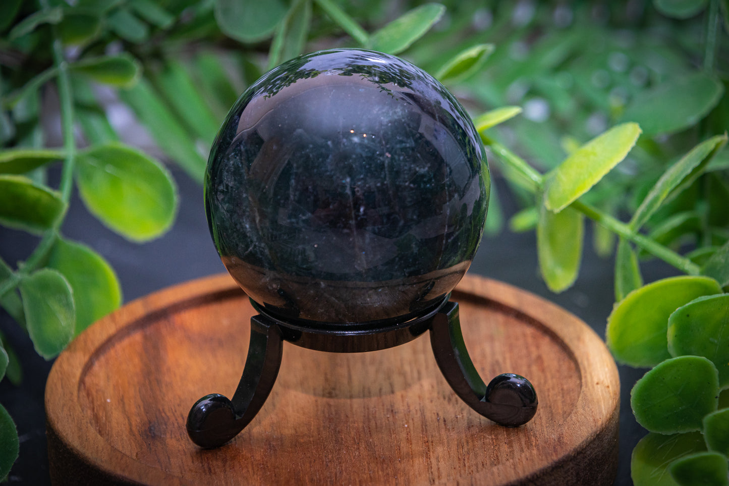 Rainbow fluorite sphere and stand