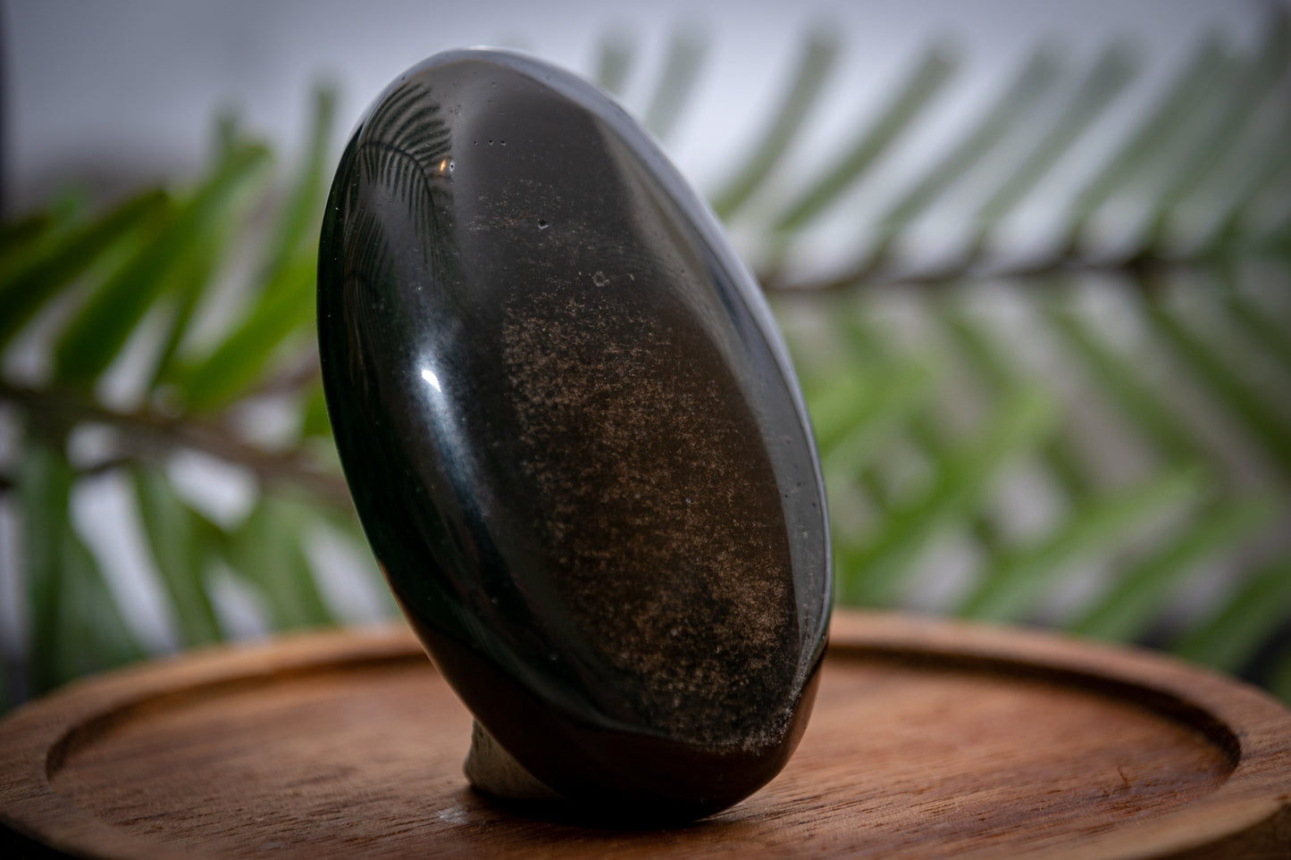 Silver sheen obsidian palm stone