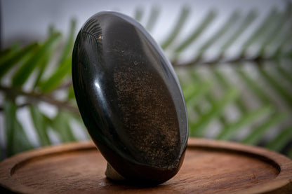 Silver sheen obsidian palm stone