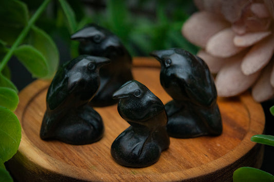 Black obsidian crow carving