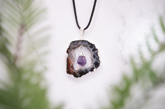 Geode slice with hanging Amethyst necklace